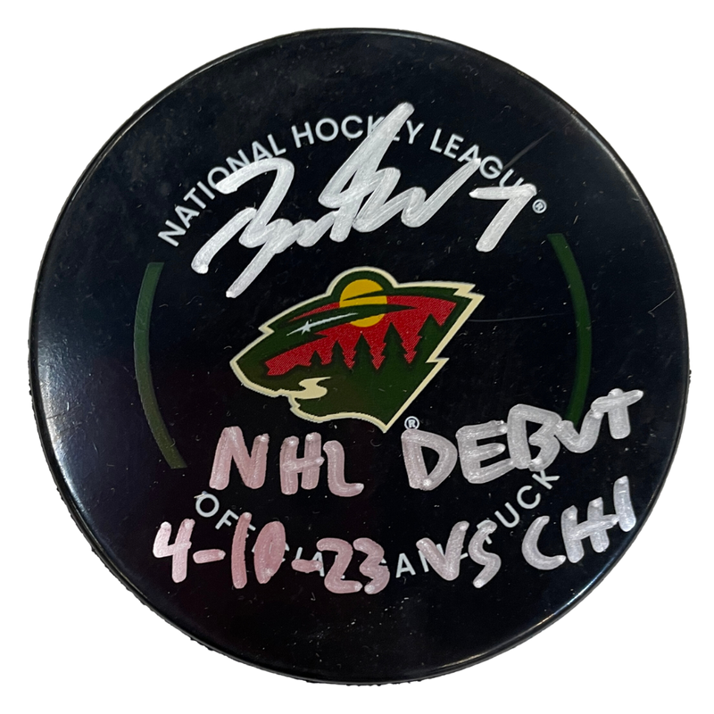 Brock Faber Autographed Minnesota Wild Official Game Puck w/ NHL Debut 4-10-23 vs. CHI