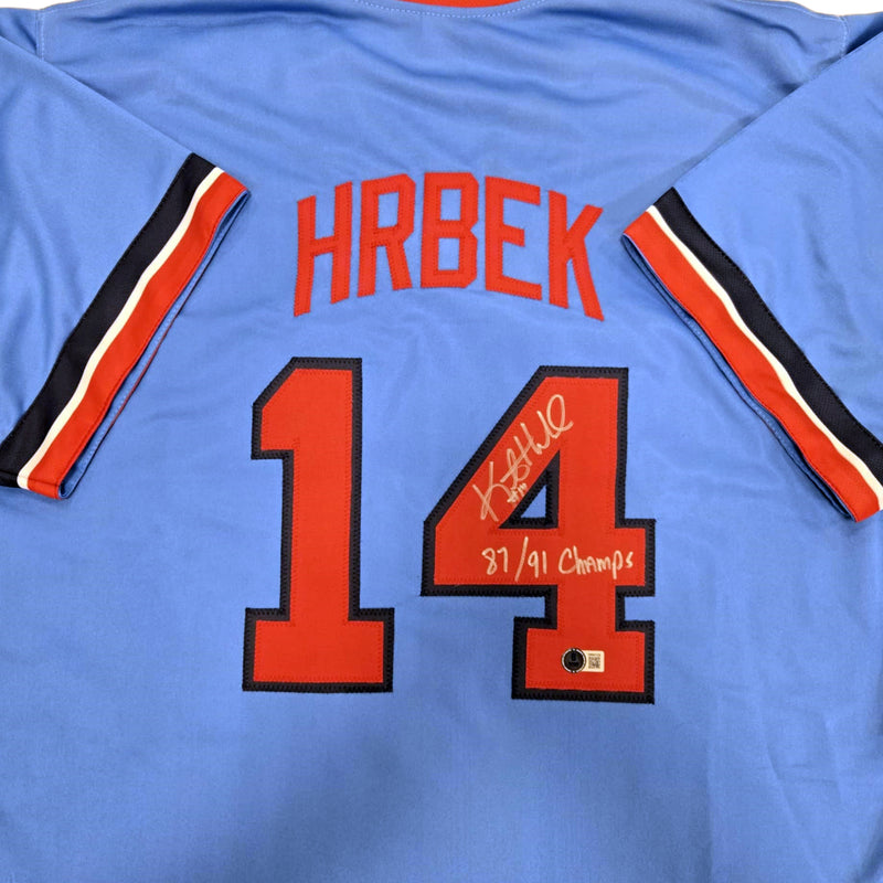 Kent Hrbek Autographed Blue Pro-Style Jersey w/ 87/91 Champs Inscription Autographs Fan HQ   