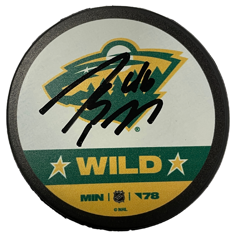 Jared Spurgeon Autographed Minnesota Wild Reverse Retro Logo Puck